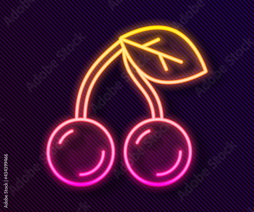 Glowing neon line Cherry icon isolated on black background. Fruit with leaf symbol. Vector