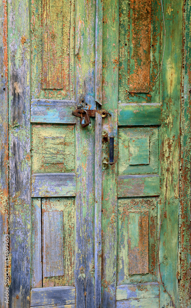 old wooden door in abandoned house