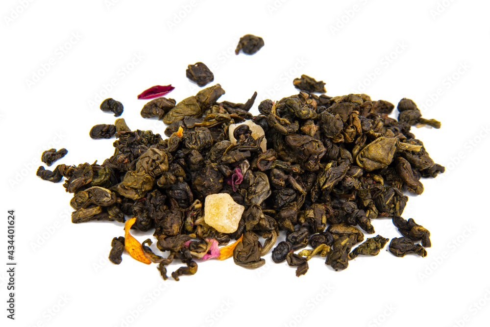Aromatic green dried tea leaves with mango isolated on the white background Aromatic green dried tea leaves with mango isolated on the white background