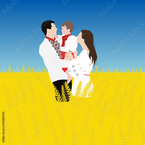 Happy smiling Ukrainian family in vyshyvanka (embroidered shirts) in wheat field. Ukraine's Independence Day. Day of the state flag of Ukraine. Mothers Day
