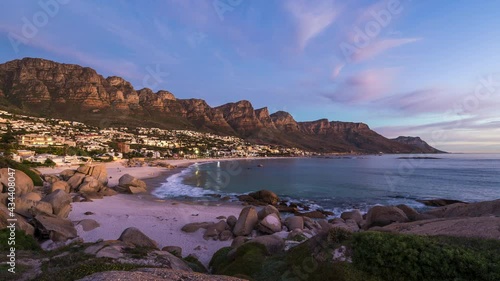 Time lapse view of sunset over Camps Bay Beach in Cape Town, Western Cape, South Africa. 