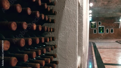 Racks with bottles of wine in storage at the Cricova winery, Moldova photo