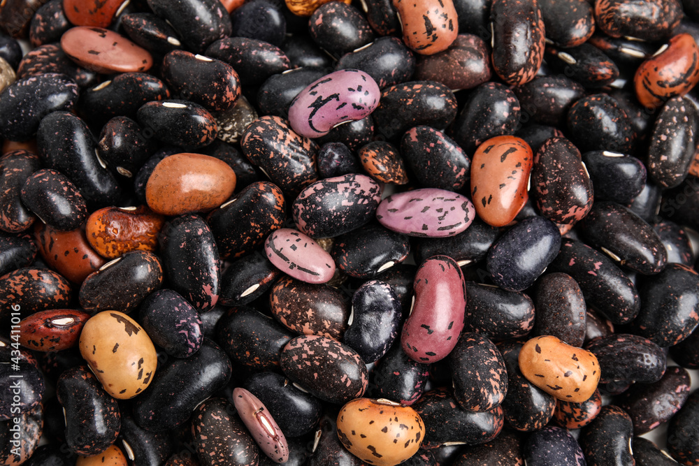 Heap of raw beans as background, top view. Veggie seeds Heap of raw beans as background, top view. Veggie seeds