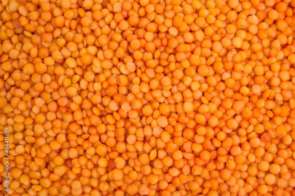 Heap of red lentils as background, top view. Veggie seeds Heap of red lentils as background, top view. Veggie seeds