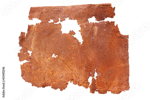 A very old piece of sheet metal, rusted through and through, with holes and ragged edges. Isolated on white background.