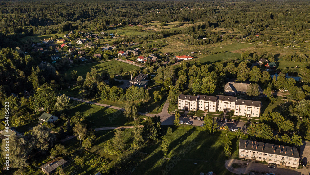 Aerial view of Mezvalde village in sunny summer evening, Latvia.