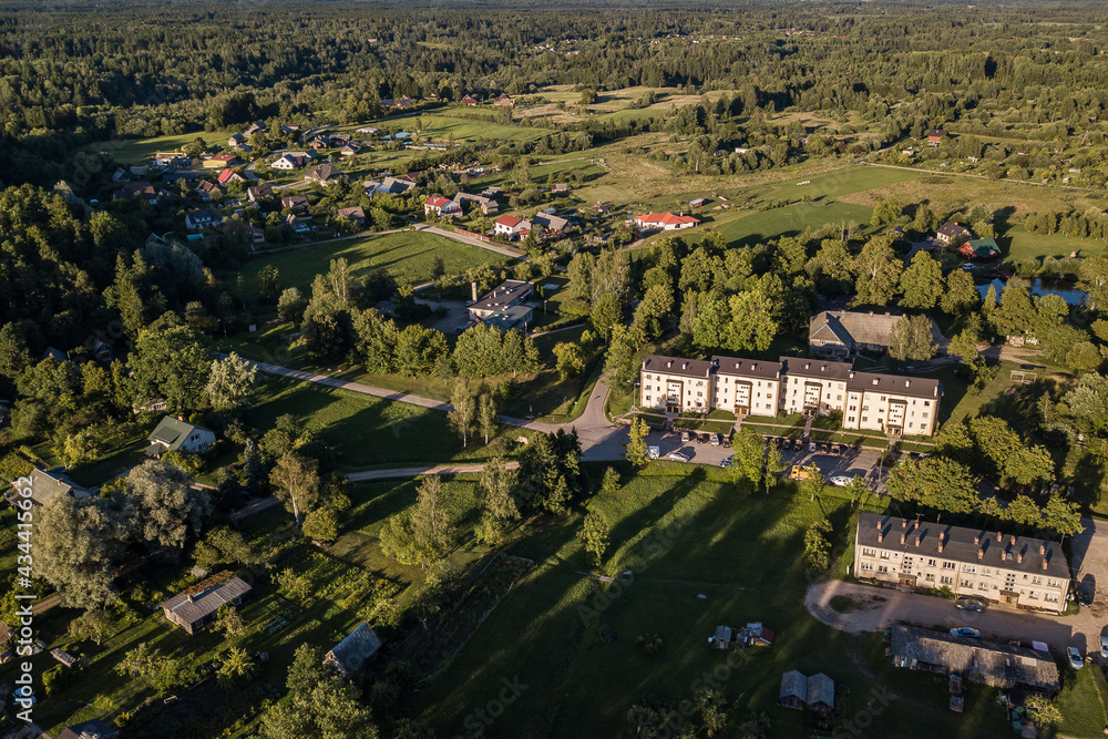 Aerial view of Mezvalde village in sunny summer evening, Latvia.