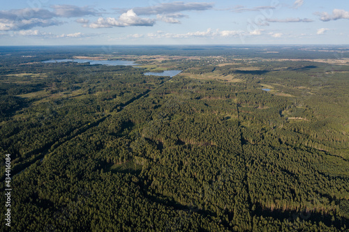 Aerial view of pond with island in Rudbarzi, Latvia.