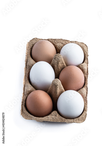 Wallpaper Mural Free range different colors eggs in cardboard container isolated on white Torontodigital.ca