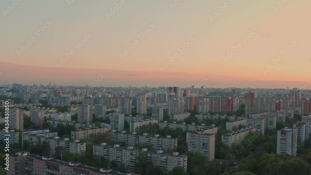 Modern sleeping area on the outskirts of Moscow in summer at sunrise, aerial view Modern sleeping area on the outskirts of Moscow in summer at sunrise, aerial view