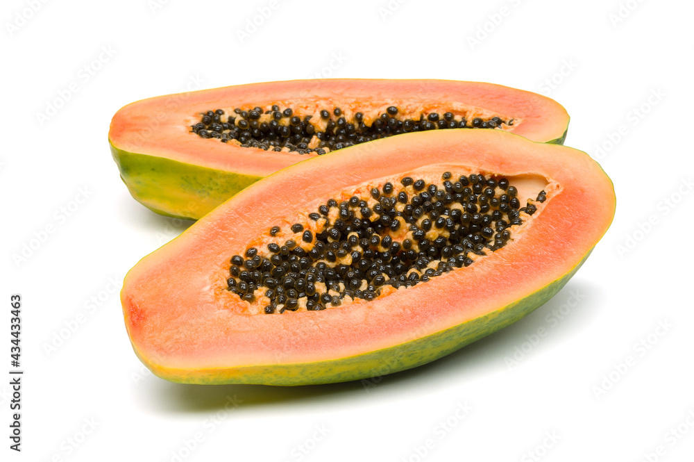 Papaya, halves of fresh juicy orange tropical fruit isolated on white background, healthy food, diet and nutrition Papaya, halves of fresh juicy orange tropical fruit isolated on white background, healthy food, diet and nutrition