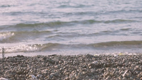 slow motion tidea coming into shoreline in washington photo