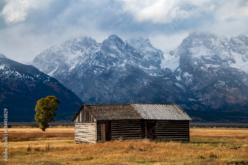 historic Moulton barns n Mormons' Row against the dramatic Teton mountain range in Wyoming.