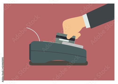 Hand swiping credit card on the EDC machine