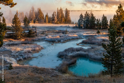 dramatic frosty and foggy autumn morning covering the yellowstone lake , hot sprinngs and cones in the West Thumb Geyser basin in Yellowstone national park in Wyoming. © Nathaniel Gonzales