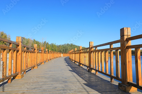 The wooden trestle is in the park