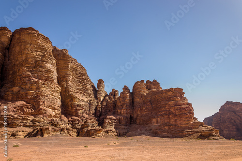 Wadi Rum (Valley of the Moon) red sand dunes, sandstone and granite rock view in southern Jordan. Wadi Rum Protected Area was named a UNESCO World Heritage Site in 2011