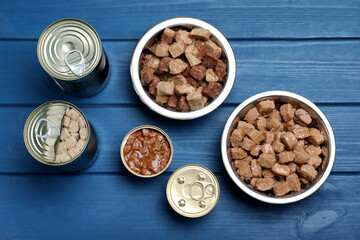 Wet pet food on blue wooden table, flat lay