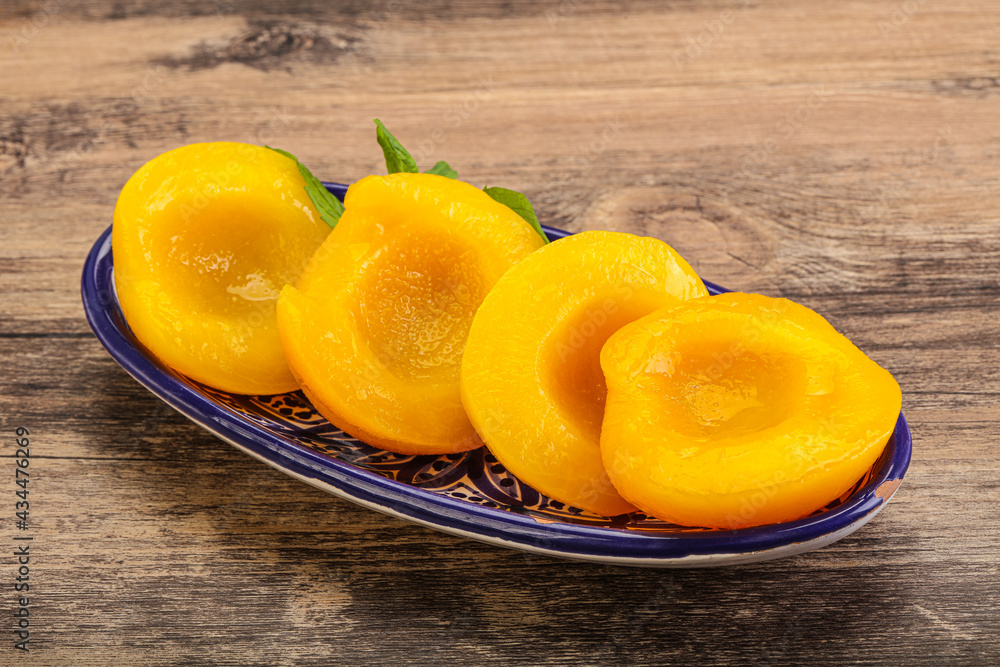 Sweet ripe canned peaches with mint Sweet ripe canned peaches with mint