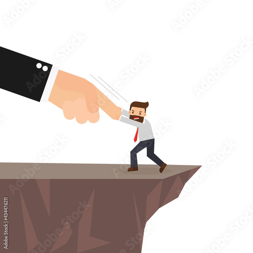 big hand push man to cliff edge