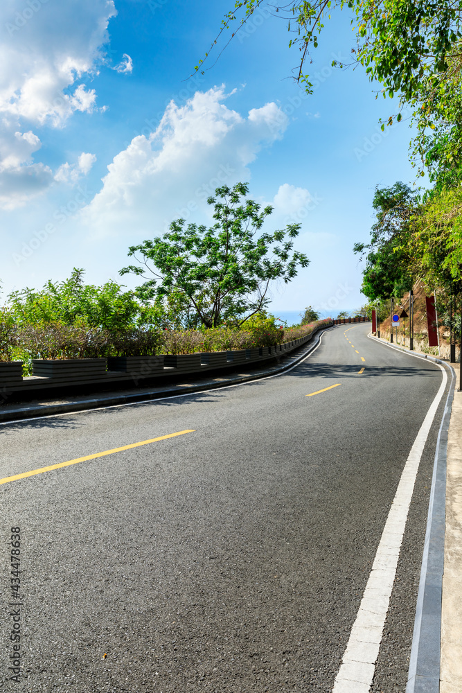 Mountain road landscape under blue sky. Mountain road landscape under blue sky.
