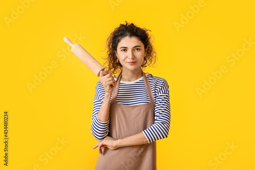 Young woman with rolling pi...