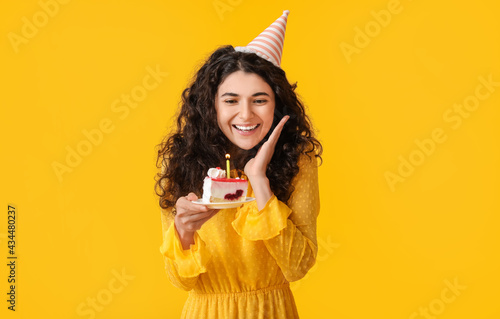 Canvas Print Beautiful woman celebrating birthday on color background