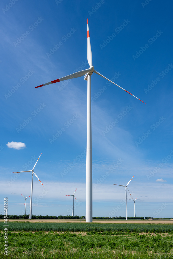 Wind energy turbines seen in rural Germany Wind energy turbines seen in rural Germany