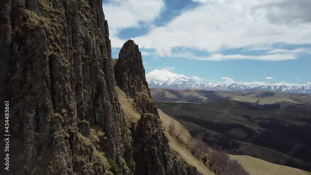 mountain range of the Caucasus mountains in the distance with a view of Elbrus flight on a drone mountain range of the Caucasus mountains in the distance with a view of Elbrus flight on a drone
