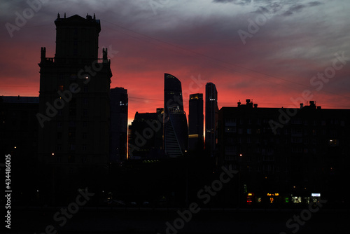 silhouette of the city on the background of sunset