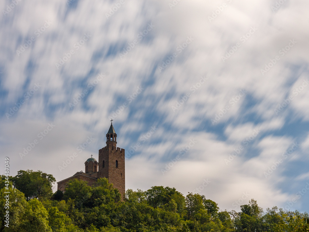 Tsarevets fortress in Veliko Tarnovo (Turnovo) in Bulgaria on a summer day with a cloudy sky.