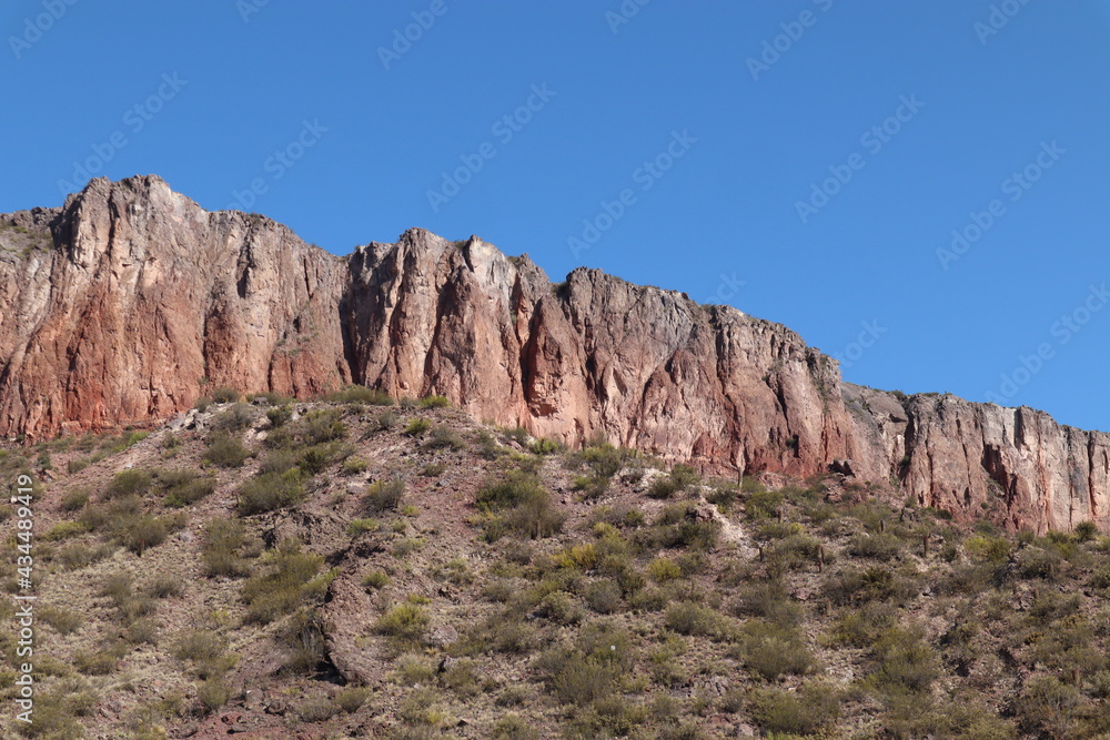 Nature scene in El Nihuil San Rafael Mendoza in Argentina South America, desert scene, dry mountains and a blue sky