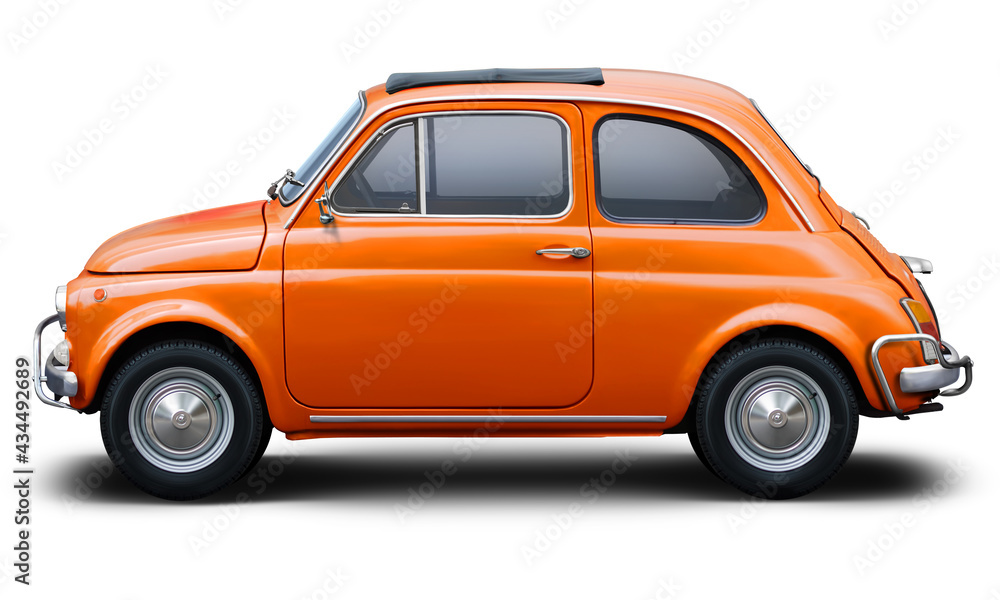 Small retro car of orange color, side view isolated on a white background.