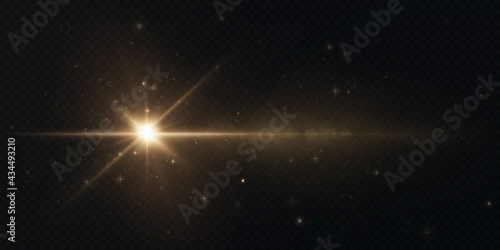 The sun is shining bright light rays with realistic glare. Light star on a transparent black background.