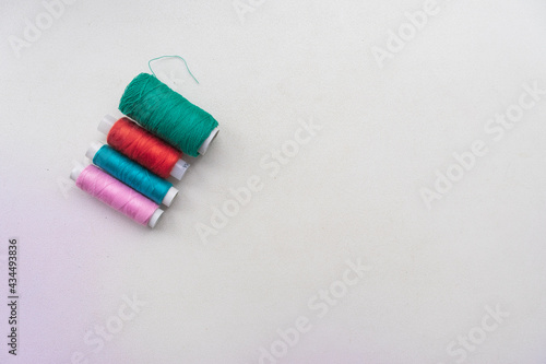 Colourful thread spools isolated on a white