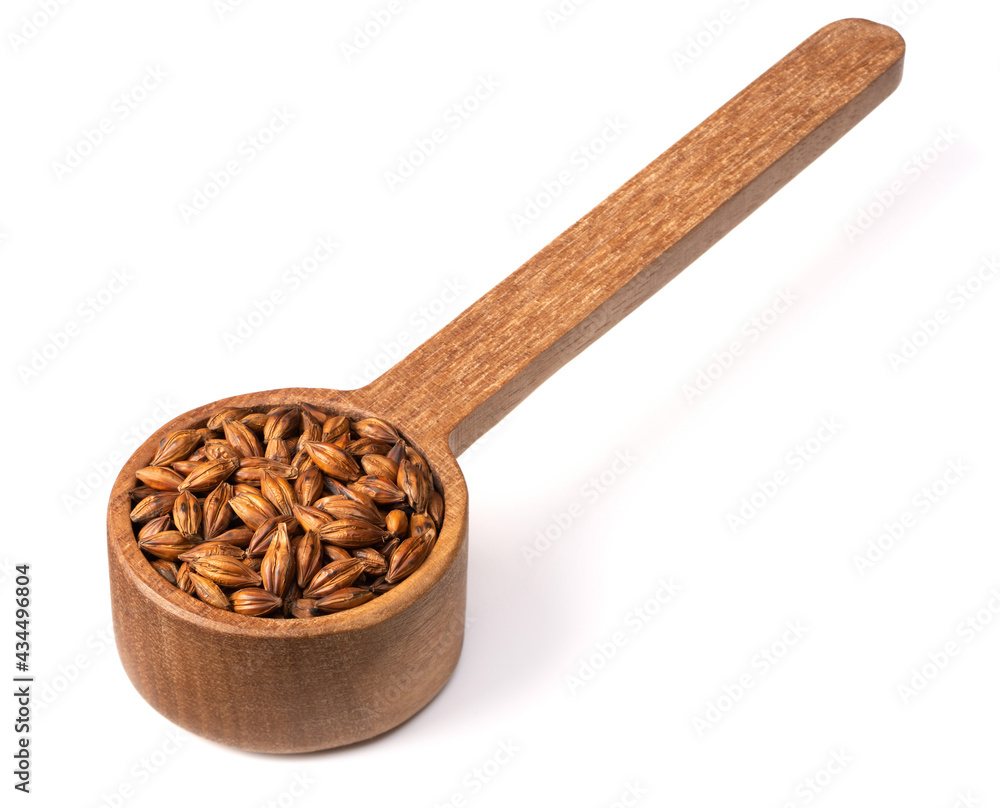 Barley Tea in the wooden spoon, isolated on pure white background Barley Tea in the wooden spoon, isolated on pure white background