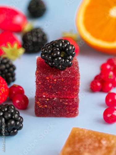 A colorful traditional French fruit jellies with fresh variant fruit as strawberry  blackberry  orange and red currant.  Ingredients are concentrate fruit paste  sugar and pectin dusting with sugar 