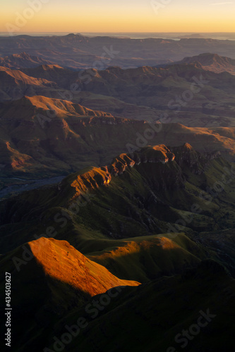 Sunrise over the Mnweni Valley from above Ledgers Cave photo