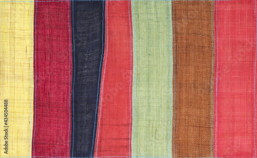 Colorful fabric texture. Fabric colorful texture Cotton close-up. Striped bright cotton texture. Colorful canvas background. Fabric texture of natural cotton or linen textile material.