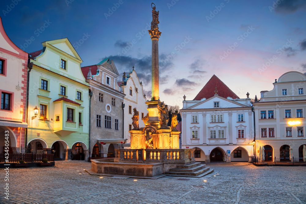 Cesky Krumlov. Cityscape image of main square of Cesky Krumlov with traditional architecture at twilight blue hour.