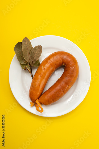 typical portuguese smoked sausage Farinheira on the dish photo
