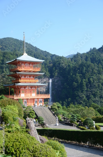 Kumano nachi taisha shrine with waterfall along in view