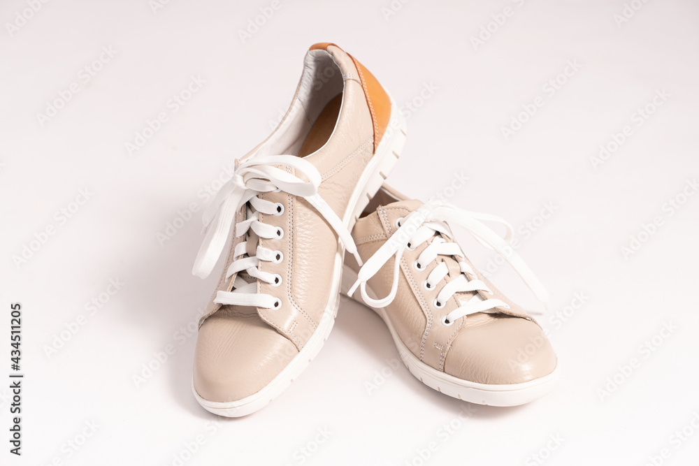 Comfortable sneakers made of beige genuine leather