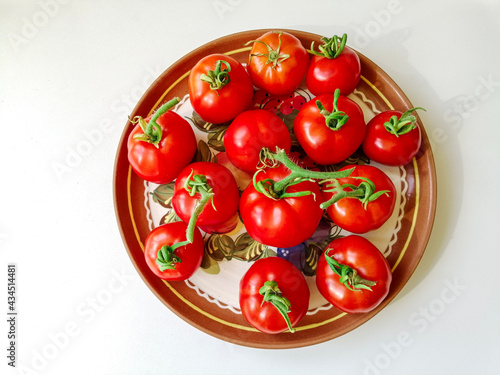 tomatoes on a plate © Igor Rafa