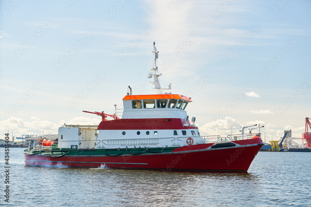Rescue cruiser in use in the port for sea rescue Rescue cruiser in use in the port for sea rescue