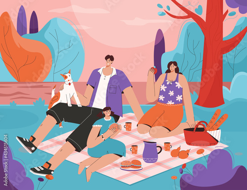 Family at picnic together. Mother, father, daughter and dog