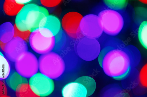 Multicolor Bokeh in a blue natural background, defocused