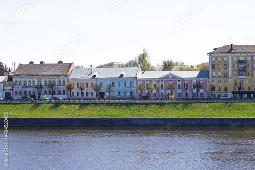 TVER, Russia, May 2021: View of the Stepan Razin Embankment on the Volga river in Tver. Old buildings on the embankment of Stepan Razin on the Volga River.