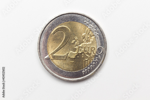 Official coin of two euros of the European Economic Community. Legal tender metal coin with different images depending on the country that issues the coin.