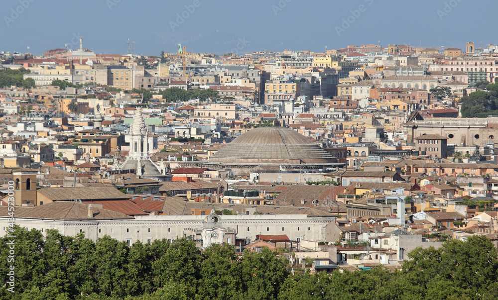 view of the city of ROME in Italy with houses palaces and monuments and the dome of the Pantheon temple